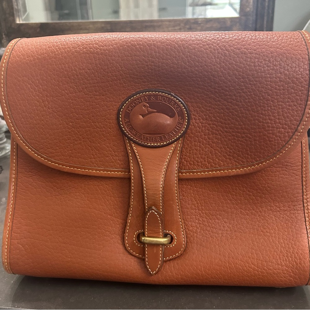 Dooney & Bourke Pebble Leather Messenger in Cognac Brown
